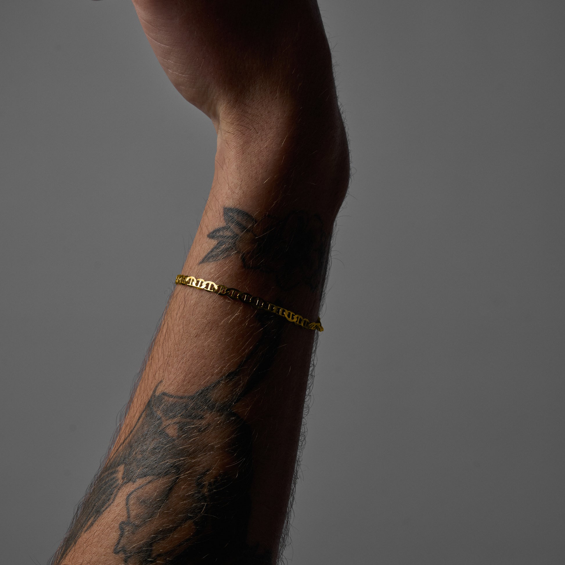 A man wearing Infinite Bracelet showcasing in wrist