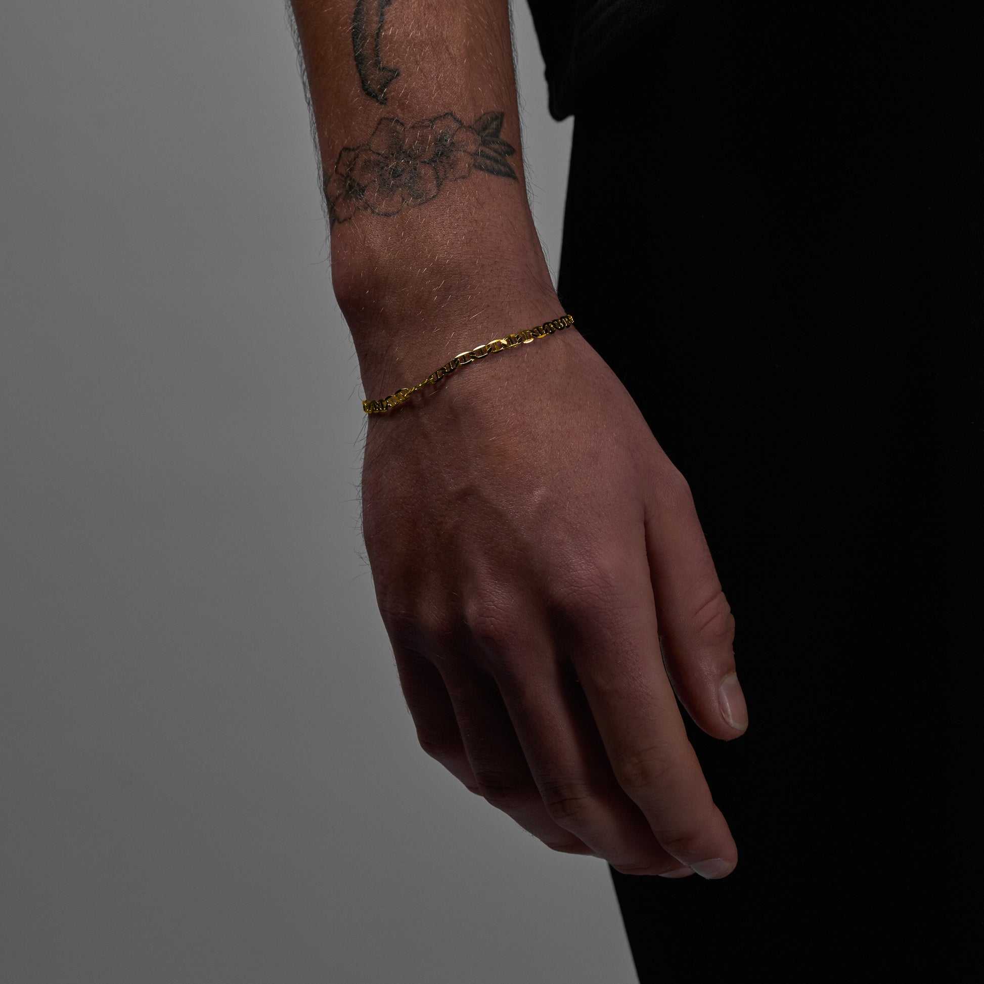 A man wearing Infinite Bracelet showcasing in wrist