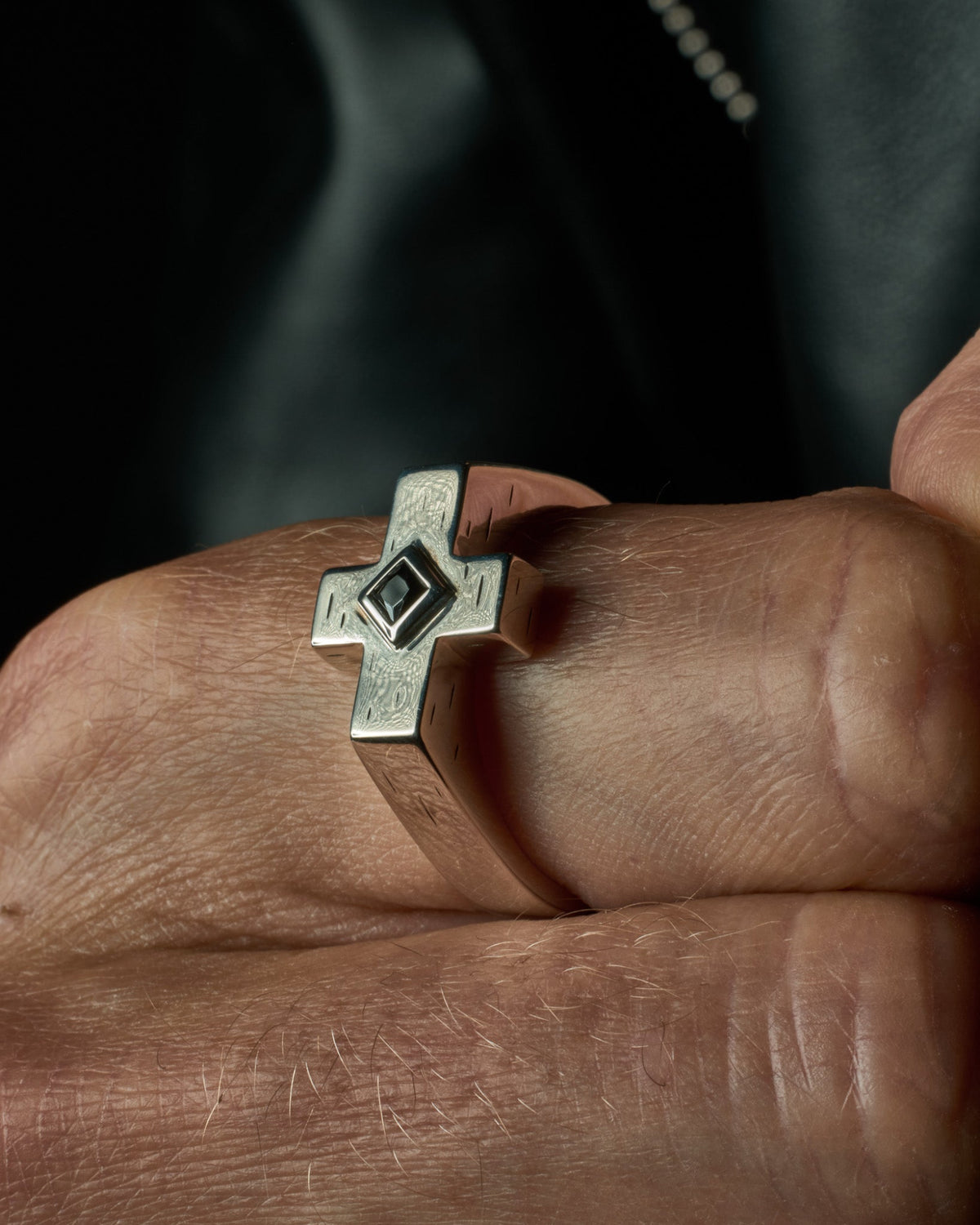 Raven Cross Ring handcrafted from solid 925 sterling silver featuring genuine black onyx.