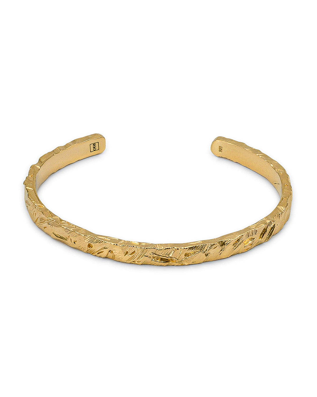 Close-up of the Jasper cuff's textured gold finish