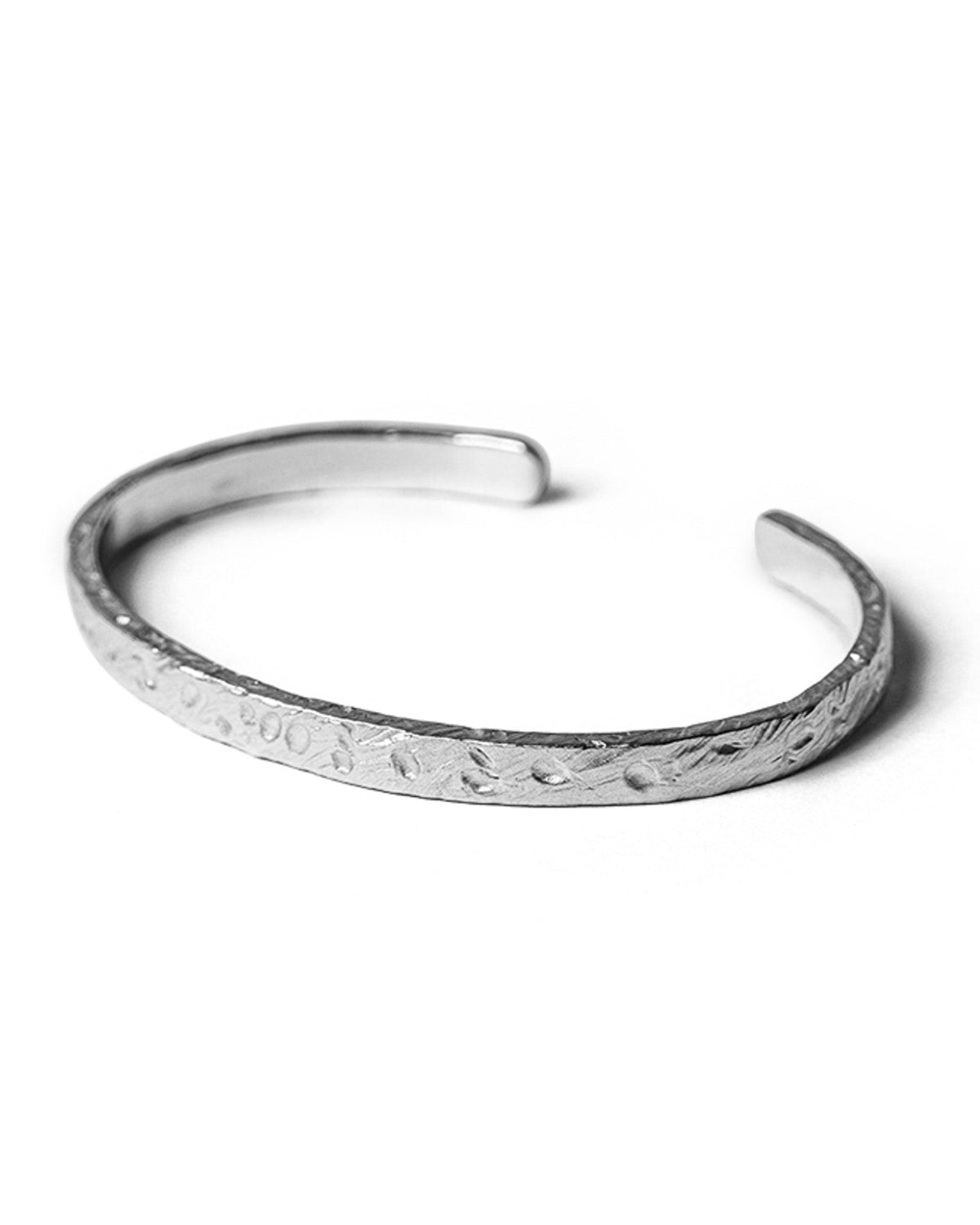 Mickey Cuff handcrafted from solid 925 sterling silver featuring a subtle organic textured finish.