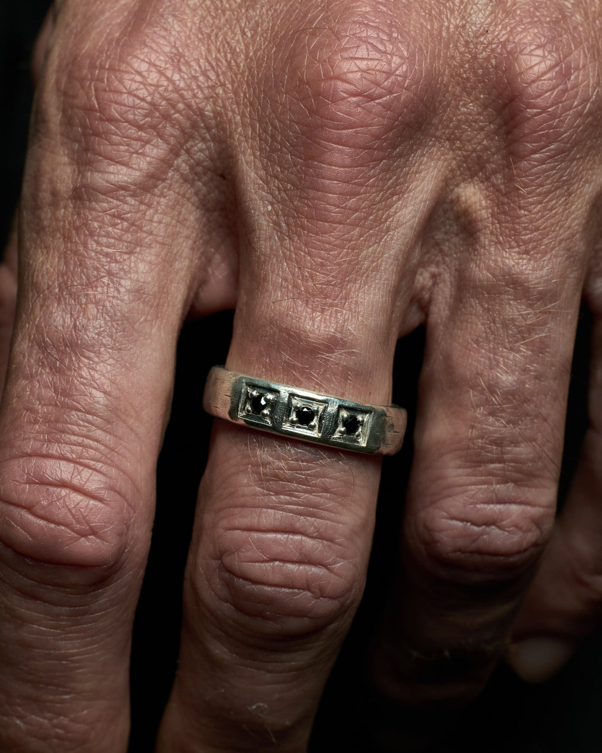 Trilogy Ring handcrafted from solid 925 sterling silver featuring genuine black onyx.